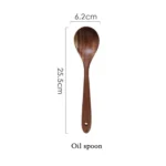 Wooden cooking utensils set with spatula, soup ladle, and rice scoop on a kitchen counter