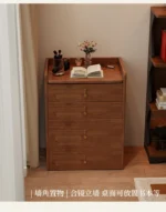 Wooden makeup vanity with mirror and stool in a modern bedroom setting