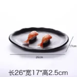 Black melamine dinner plates stacked elegantly on a wooden table