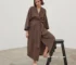 Woman wearing brown women's summer sleepwear cotton robe with three-quarter sleeves and sash
