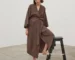 Woman wearing brown women's summer sleepwear cotton robe with three-quarter sleeves and sash