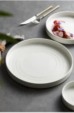 Elegant gold rim plates set on a table