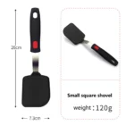 Goldoma high heat resistant spatula in use on a non-stick frying pan