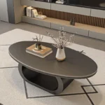 Modern coffee table with sintered stone top in black frame and bright fish belly white finish, rectangular shape