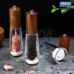 Manual pepper grinder with acrylic body and ceramic core on kitchen counter