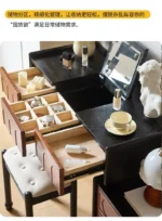 Goldoma ash wood dressing table with mirror and six drawers in a bedroom setting