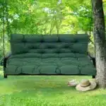 Outdoor bench cushion on a wooden garden bench with vibrant floral pattern