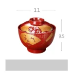 Japanese style ramen bowl set with melamine bowls, spoons, and noodle cups on a table