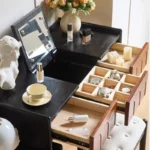Goldoma ash wood dressing table with mirror and six drawers in a bedroom setting