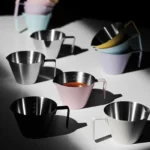 Stainless steel espresso measuring cup with precise scale and single spout