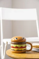 Large ceramic mug with lid in hamburger shape, 300ml capacity, colorful design