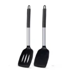 Goldoma silicone spatula set with two heat-resistant spatulas on a nonstick pan