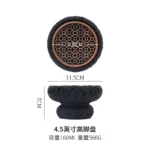 Volcanic stone sushi plate with fresh sushi rolls and wasabi on a dark textured surface