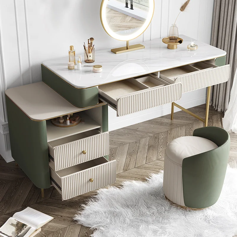 S09bb3a77179a4c2497678d203bb8e768b.webp Modern dressing table set with two drawers, mirror, and stool in a bedroom setting
