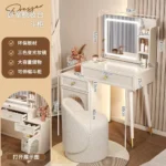 Modern makeup vanity with mirror and stool in a bedroom setting, featuring four drawers and sleek wooden design – Goldoma