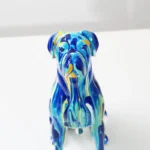 Boxer dog decor placed on an office desk, creative art style.