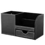 Multifunctional storage box in brown leather PU, holding pens, scissors, and a remote.