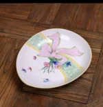 Hand painted ceramic vase from Monet Garden Fascination series with floral motifs