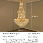 Modern crystal chandelier for dining room hanging over a wooden table with warm glow