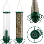 Hanging squirrel proof bird feeder in garden with a chickadee feeding