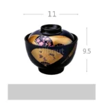 Japanese style ramen bowl set with melamine bowls, spoons, and noodle cups on a table