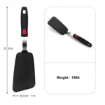 Goldoma high heat resistant spatula in use on a non-stick frying pan