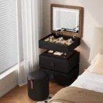 Modern lifting vanity table with mirror in cream finish, featuring rotating top and adjustable height for bedroom use