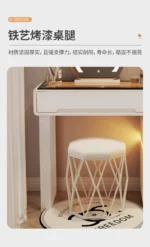 Luxury modern dressing table with mirror and stool in bedroom setting featuring compact vanity with drawers