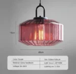 Modern colored glass pendant lamp illuminating a cozy dining room with vibrant hues