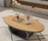 Modern coffee table with rectangular sintered stone top in living room