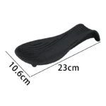 Silicone spoon rest holding a wooden spoon on a kitchen counter