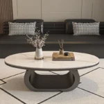 Modern coffee table with sintered stone top in black frame and bright fish belly white finish, rectangular shape