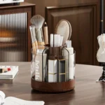 White desk accessory organizer filled with pens, pencils, and markers on a modern office desk.