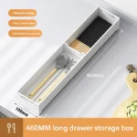 Kitchen drawer organizer with compartments for cutlery and utensils