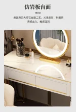 French white wooden dressing table with mirror and stool in a modern bedroom setting