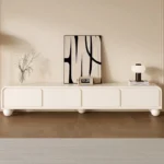 Nordic wood TV stand with drawers in a modern living room corner, featuring clean lines and ample storage
