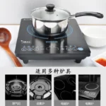 Goldoma stainless steel milk pot with lid on a kitchen stove