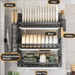 Wall mounted dish rack with drainboard and cutlery holder in a modern kitchen