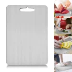 Double thick titanium cutting board with juice groove on a kitchen countertop