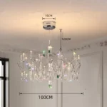 Modern stainless steel chandelier with crystal LED lights in a living room