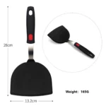 Goldoma high heat resistant spatula in use on a non-stick frying pan