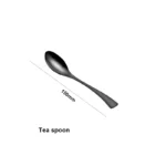 Luxury black 18/10 stainless steel cutlery set arranged on a table