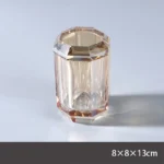 Soap dispenser with transparent body and black pump.