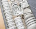 Elegant 20-piece porcelain dinnerware set arranged on a table, showcasing bowls and plates in a gift box