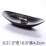 Black melamine dinner plates stacked elegantly on a wooden table