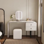 modern extendable dressing table with mirror and stool in a bedroom