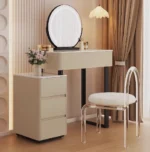 Modern vanity table with mirror and storage drawers in a bedroom setting