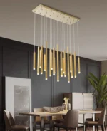 Gold leaf shaped pendant light in a botanical themed living room.
