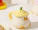 Cute ceramic coffee mug with cartoon duck underglaze design on white background
