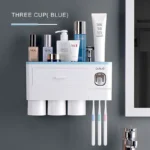 Angle shot showing the toothpaste dispenser nozzle and the push mechanism for dispensing.